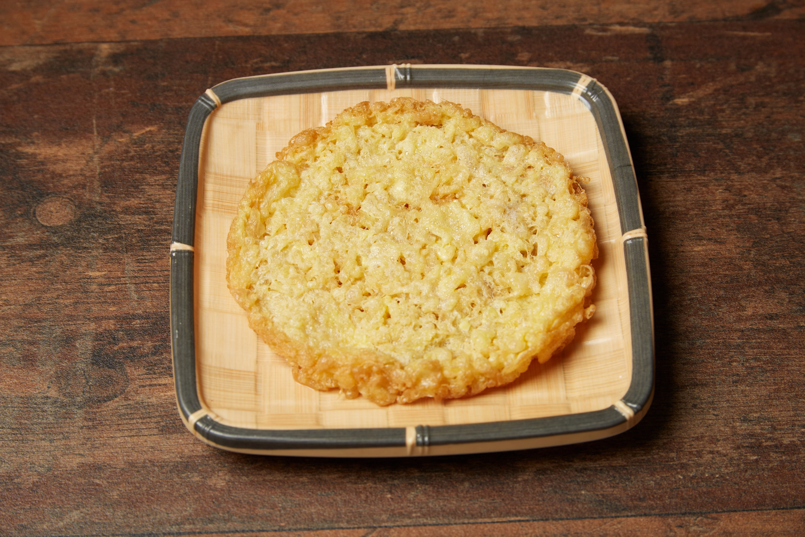 Close-up of broth bubbling with tender beef slices