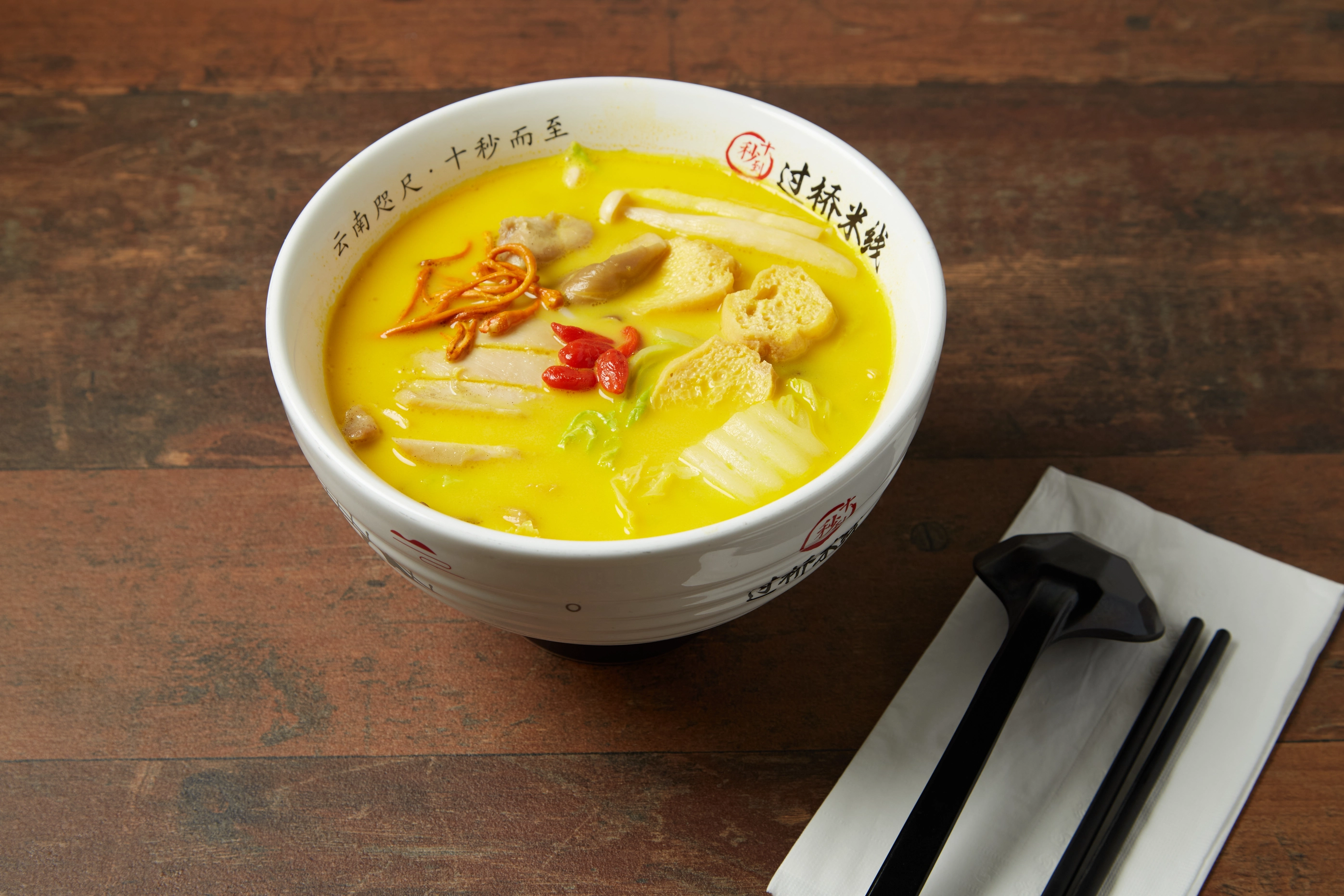 Collagen chicken rice noodles plated with crisp vegetables